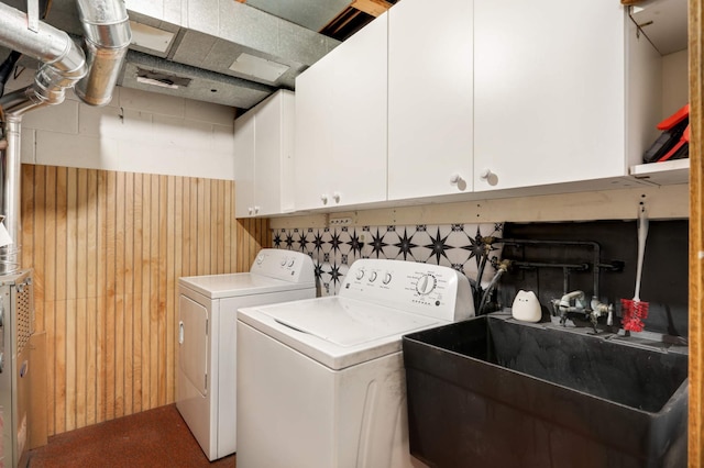 2628 Sumac Ct, White Bear Lake, MN 55110 - washroom with cabinet space, separate washer and dryer, and wooden walls