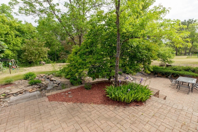 11378 230th St, Cold Spring, MN 56320 - view of patio featuring a playground