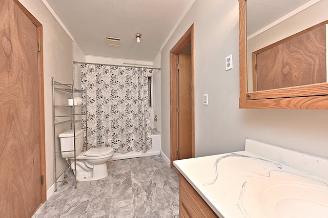 bathroom with vanity, toilet, shower / bath combo with shower curtain, and baseboards
