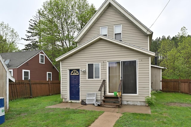 back of house with entry steps
