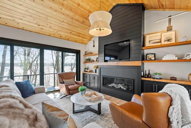 living area with a large fireplace, wood finished floors, wood ceiling, and vaulted ceiling
