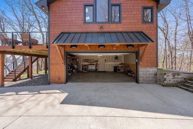 garage featuring driveway