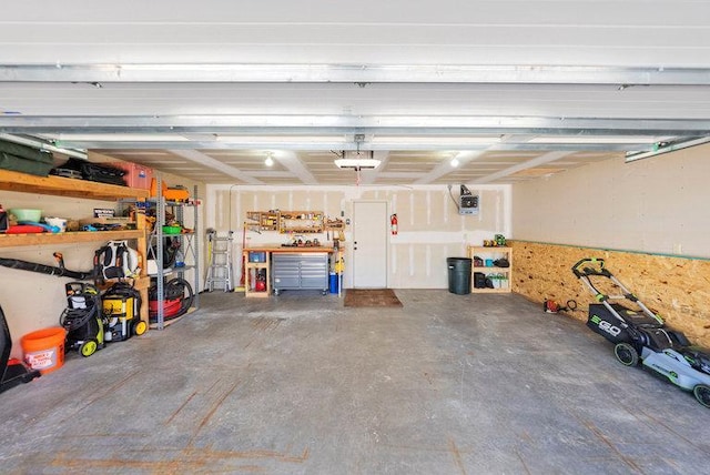 garage with a workshop area