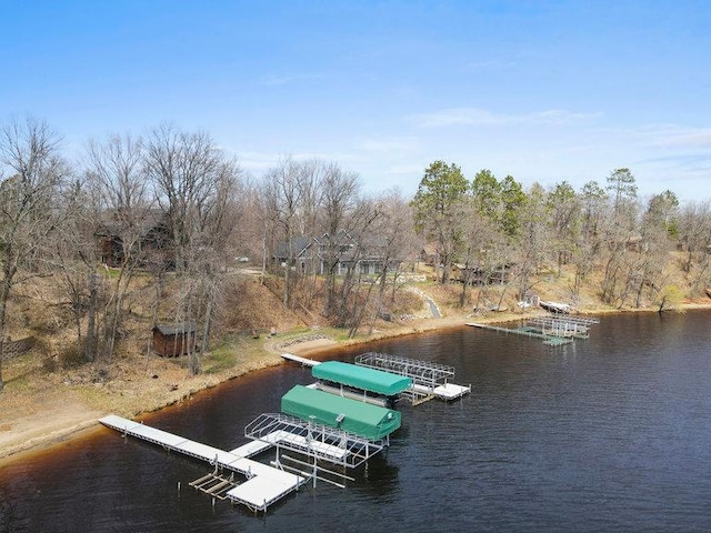 dock area featuring a water view and boat lift
