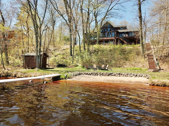 dock with stairway and a water view