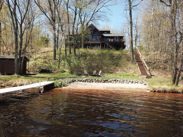 dock with stairs and a water view