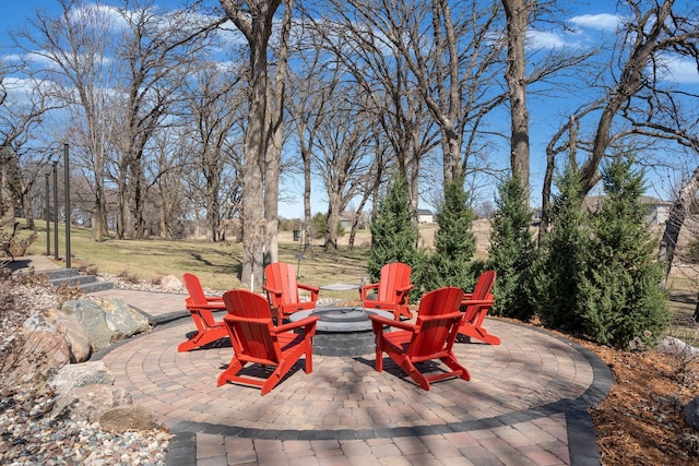2834 12th Ave NW, Austin, MN 55912 - view of patio / terrace featuring a fire pit