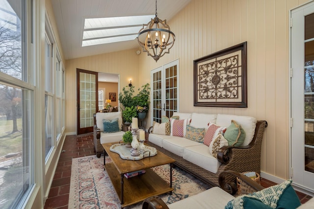 2834 12th Ave NW, Austin, MN 55912 - sunroom with vaulted ceiling, a skylight, a chandelier, and french doors