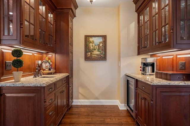 2834 12th Ave NW, Austin, MN 55912 - bar with baseboards, a sink, dark wood-type flooring, and wine cooler