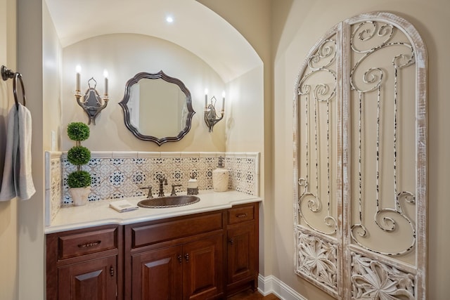 2834 12th Ave NW, Austin, MN 55912 - bathroom featuring tasteful backsplash and vanity