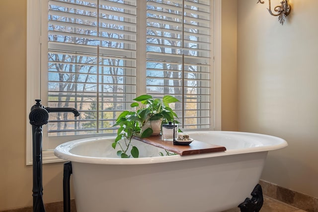 2834 12th Ave NW, Austin, MN 55912 - full bathroom featuring a freestanding bath and plenty of natural light