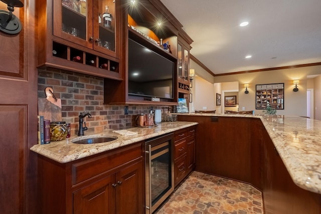 2834 12th Ave NW, Austin, MN 55912 - kitchen featuring wine cooler, a sink, tasteful backsplash, light stone countertops, and glass insert cabinets