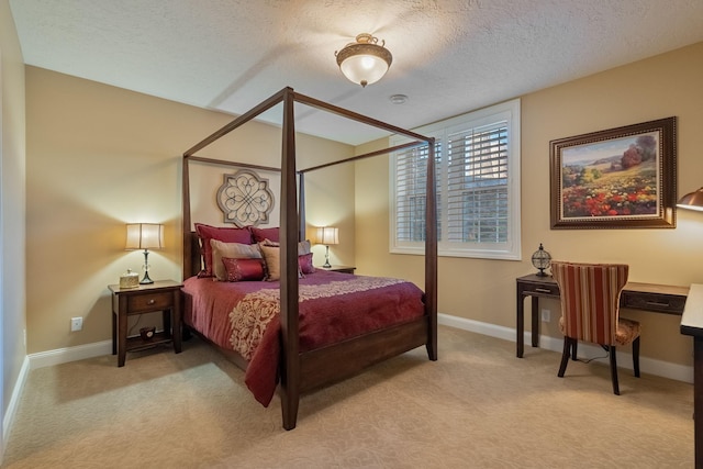 2834 12th Ave NW, Austin, MN 55912 - bedroom featuring light colored carpet, a textured ceiling, and baseboards