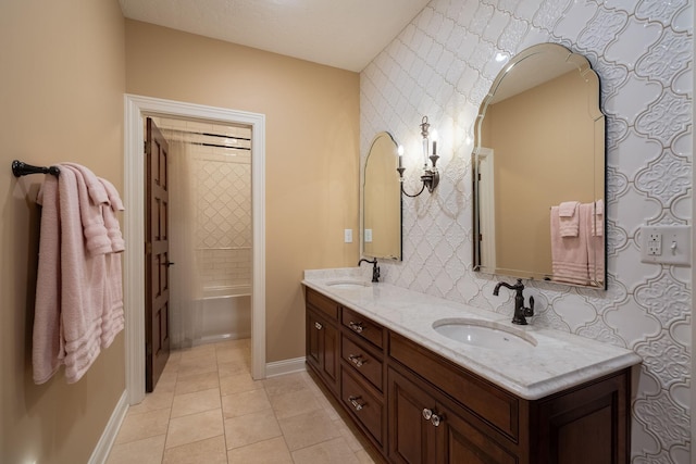 2834 12th Ave NW, Austin, MN 55912 - bathroom with tile patterned floors, double vanity, baseboards, and shower / bath combination