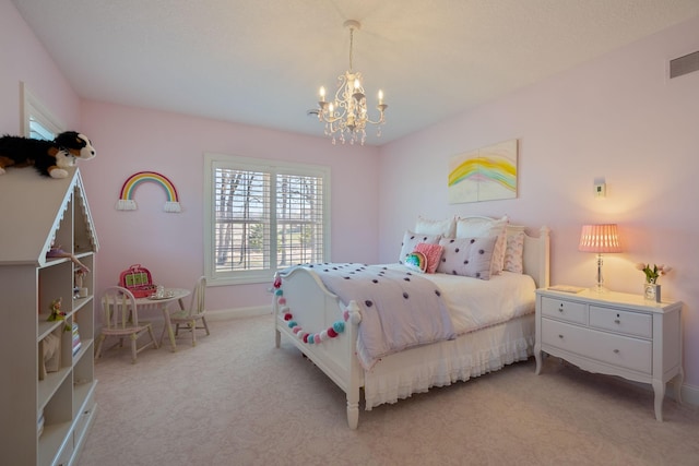 2834 12th Ave NW, Austin, MN 55912 - bedroom with light carpet, a chandelier, and baseboards