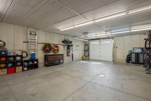 2834 12th Ave NW, Austin, MN 55912 - garage featuring a garage door opener