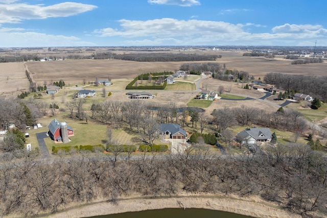 2834 12th Ave NW, Austin, MN 55912 - aerial view of property and surrounding area with rural landscape and a large body of water