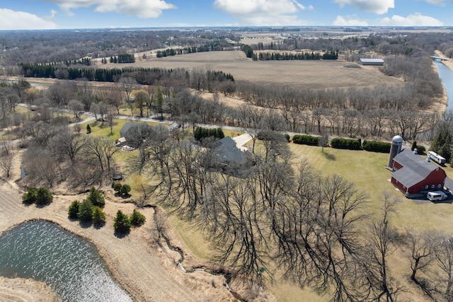 2834 12th Ave NW, Austin, MN 55912 - aerial overview of property's location with rural landscape and a nearby body of water