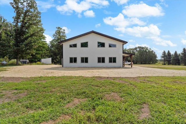 16688 248th St, Long Prairie, MN 56347 - back of property featuring a yard, an outdoor structure, and an outbuilding