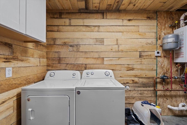 16688 248th St, Long Prairie, MN 56347 - washroom with cabinet space, wooden ceiling, washing machine and dryer, and wooden walls