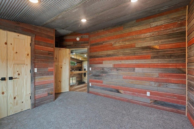 16688 248th St, Long Prairie, MN 56347 - interior space featuring wooden walls, recessed lighting, and carpet