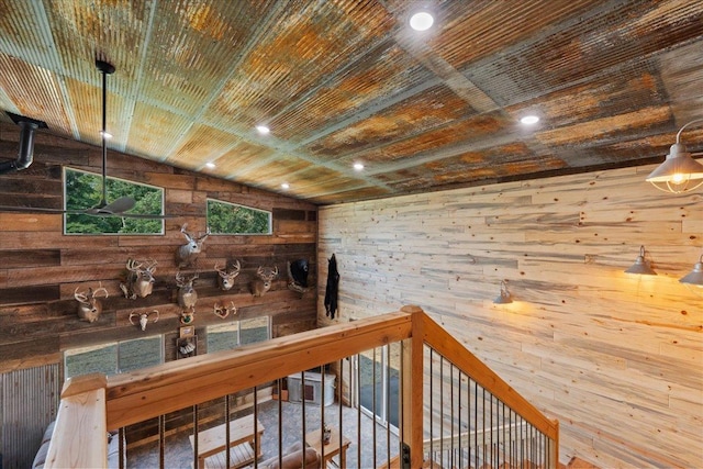 16688 248th St, Long Prairie, MN 56347 - corridor featuring wooden walls, an upstairs landing, lofted ceiling, and wood ceiling