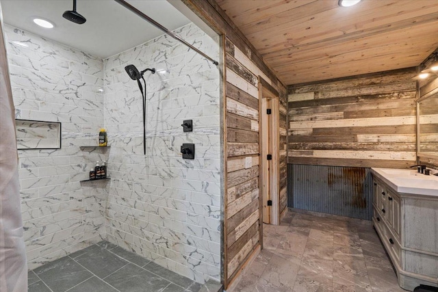 16688 248th St, Long Prairie, MN 56347 - bathroom with wood walls, a tile shower, wooden ceiling, and vanity