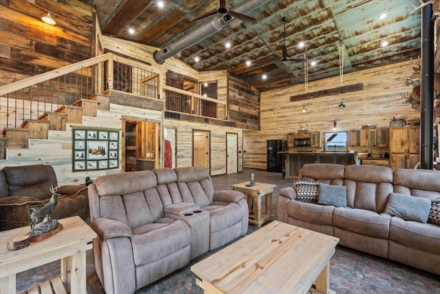 16688 248th St, Long Prairie, MN 56347 - living room with wooden walls, stairway, and a high ceiling