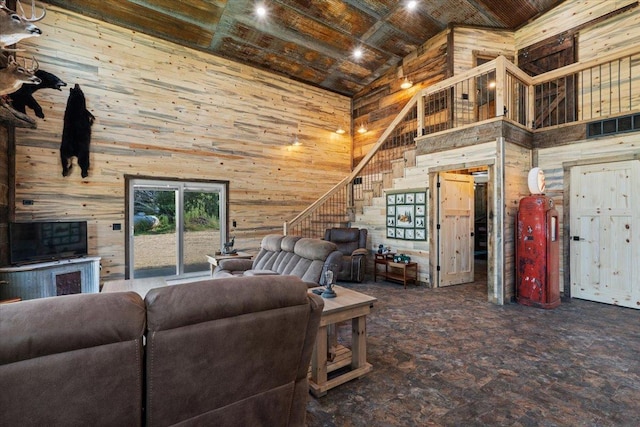 16688 248th St, Long Prairie, MN 56347 - living room featuring wood ceiling, high vaulted ceiling, wood walls, and stairway
