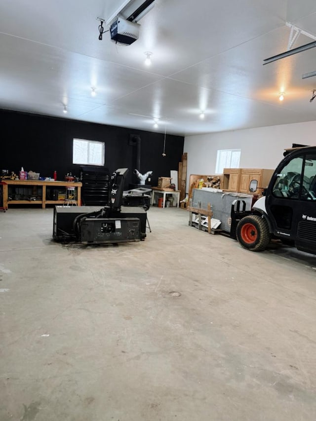35629 Rush Lake Loop Unit 32, Rush Lake Twp, MN 56571 - garage featuring a workshop area and a garage door opener