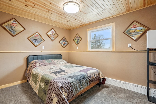 carpeted bedroom featuring wooden ceiling, a textured wall, and baseboards