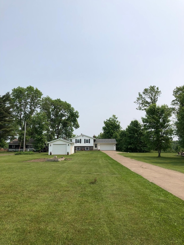 1794 White Ash Dr, Apple River Twp, WI 54810 - view of front of house featuring a front yard and a garage