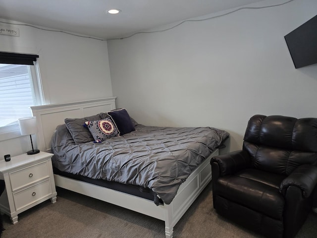 bedroom featuring recessed lighting and dark colored carpet