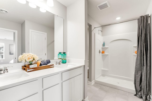 939 Redfield Cir, Delano, MN 55328 - full bath featuring a sink, visible vents, and a stall shower