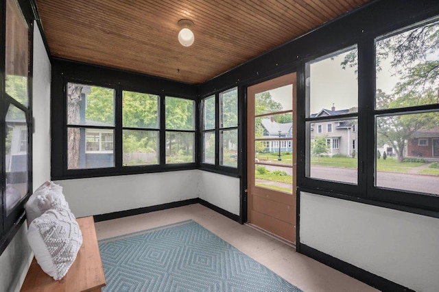2136 Temple Ct, Saint Paul, MN 55104 - unfurnished sunroom with wood ceiling and baseboards