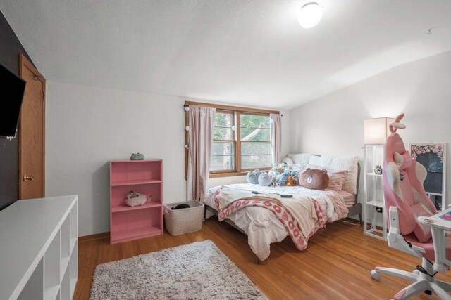 2136 Temple Ct, Saint Paul, MN 55104 - bedroom featuring wood finished floors