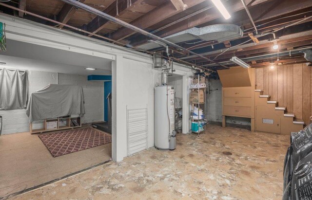 2136 Temple Ct, Saint Paul, MN 55104 - unfinished basement featuring gas water heater and stairs