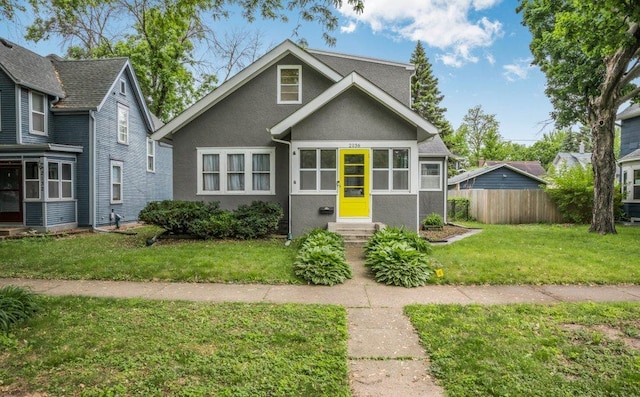 2136 Temple Ct, Saint Paul, MN 55104 - view of front of home featuring entry steps and stucco siding