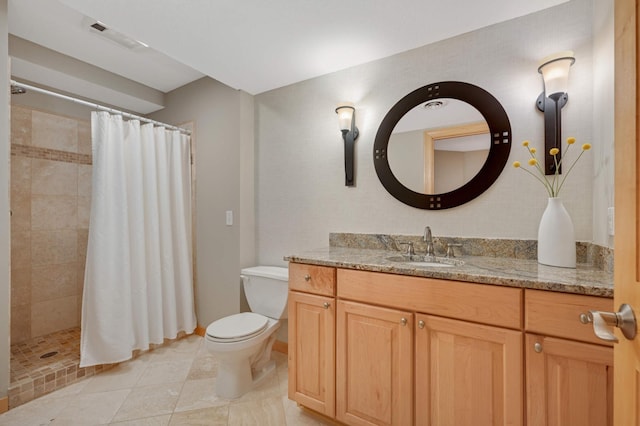 full bath with vanity, visible vents, toilet, tile patterned floors, and a tile shower