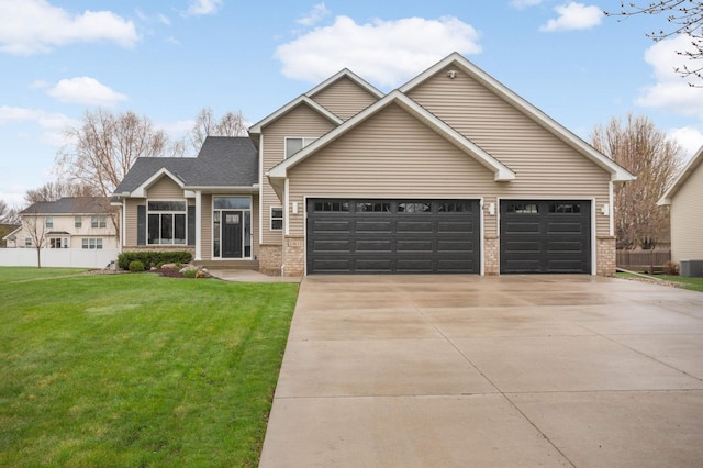 craftsman-style home with driveway, a front yard, brick siding, fence, and an attached garage