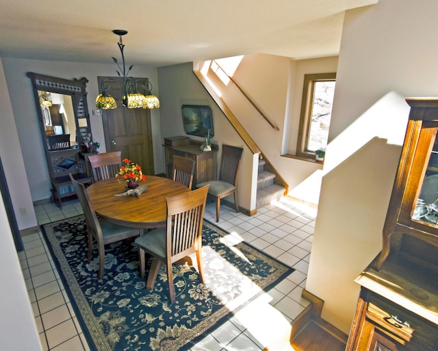 32990 Heilberger Dr, Erhard, MN 56534 - dining room with stairway and tile patterned floors