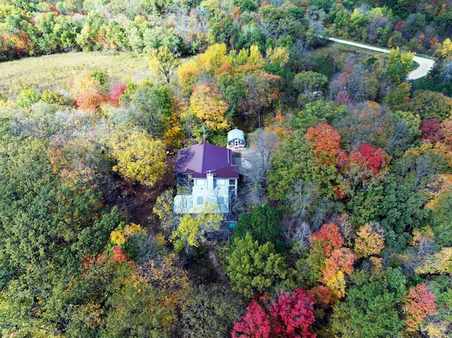 32990 Heilberger Dr, Erhard, MN 56534 - aerial view of property and surrounding area featuring a heavily wooded area