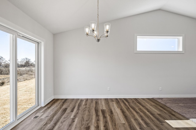 unfurnished room featuring visible vents, a chandelier, vaulted ceiling, and a healthy amount of sunlight
