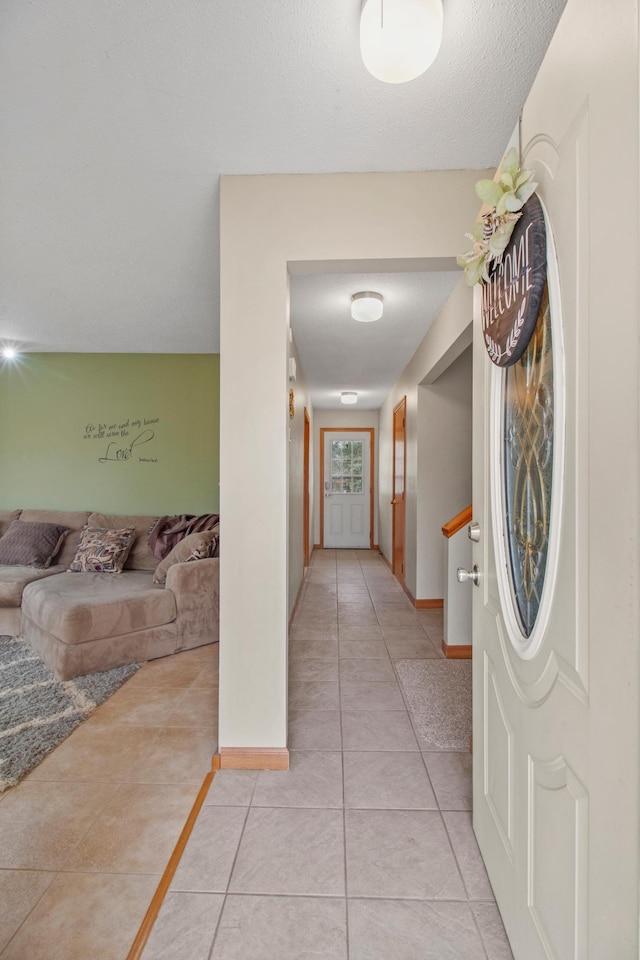 103 8th St N, Sartell, MN 56377 - corridor with baseboards and light tile patterned floors
