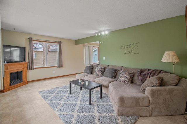 103 8th St N, Sartell, MN 56377 - living area with a fireplace and light tile patterned floors