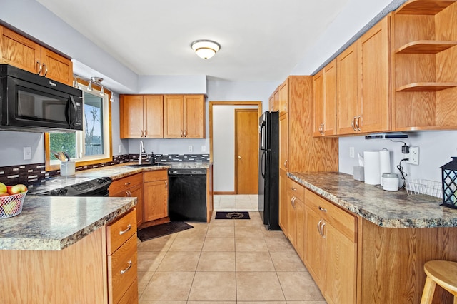 103 8th St N, Sartell, MN 56377 - kitchen with dark countertops, open shelves, a sink, black appliances, and light tile patterned flooring