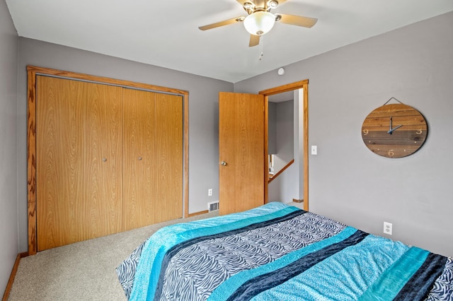 103 8th St N, Sartell, MN 56377 - carpeted bedroom featuring a ceiling fan and a closet