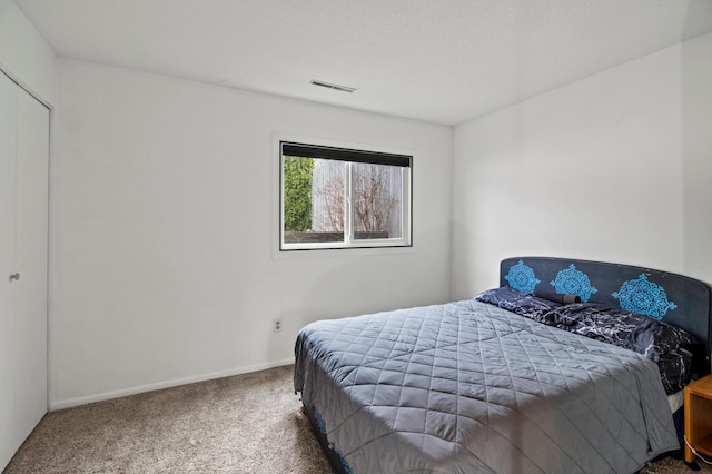 103 8th St N, Sartell, MN 56377 - bedroom with carpet floors, visible vents, and baseboards