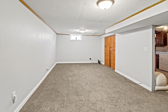 103 8th St N, Sartell, MN 56377 - basement featuring carpet floors, baseboards, a textured ceiling, and crown molding