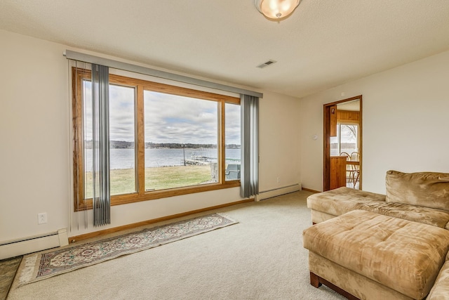 50568 Lakeside Cir, Rush City, MN 55069 - living area featuring a baseboard radiator, a water view, carpet, and baseboard heating